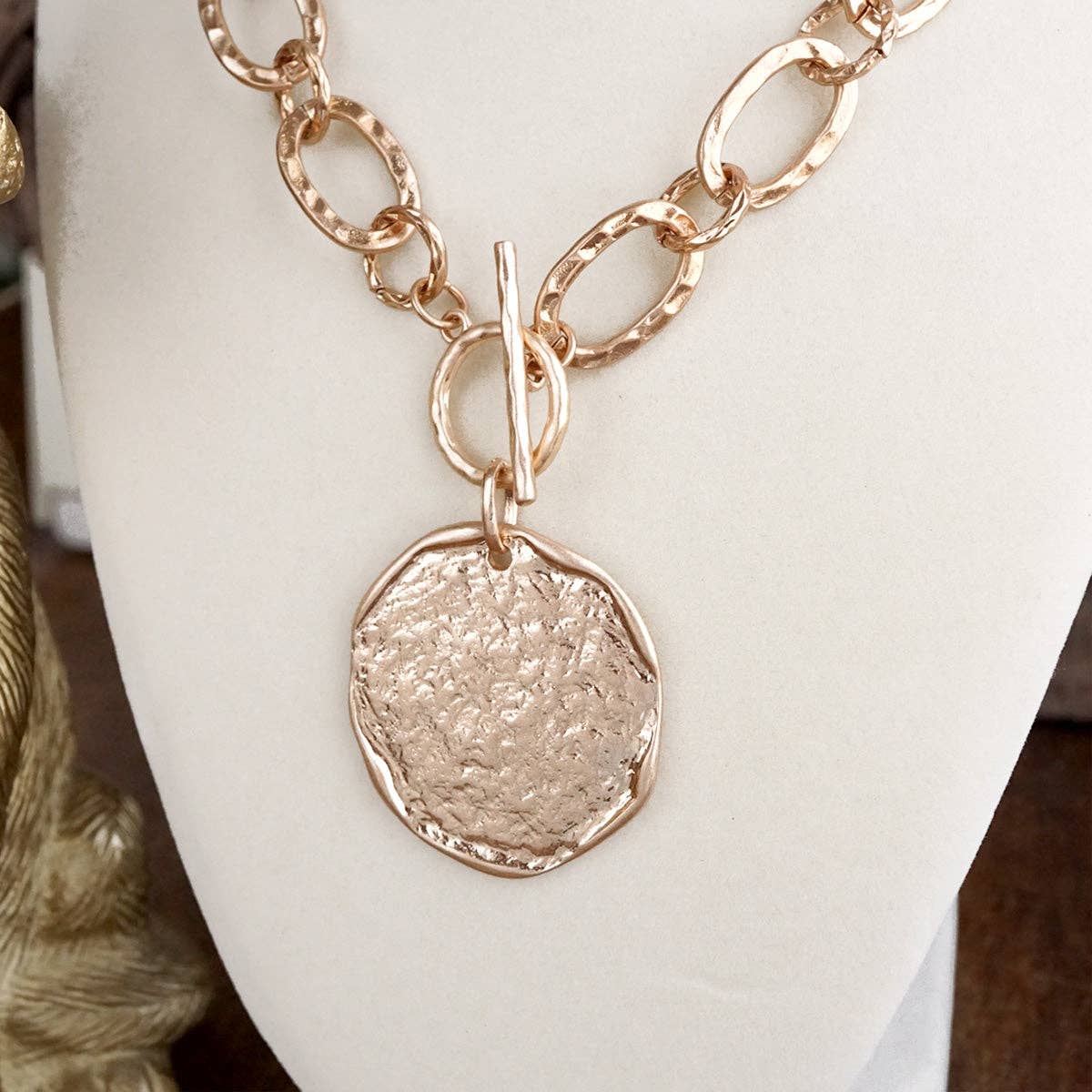 Nomad Glow – Front Toggle Statement Necklace with Hammered Disc