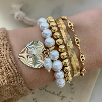 Freshwater pearl gold heart charmed bracelet  coquette