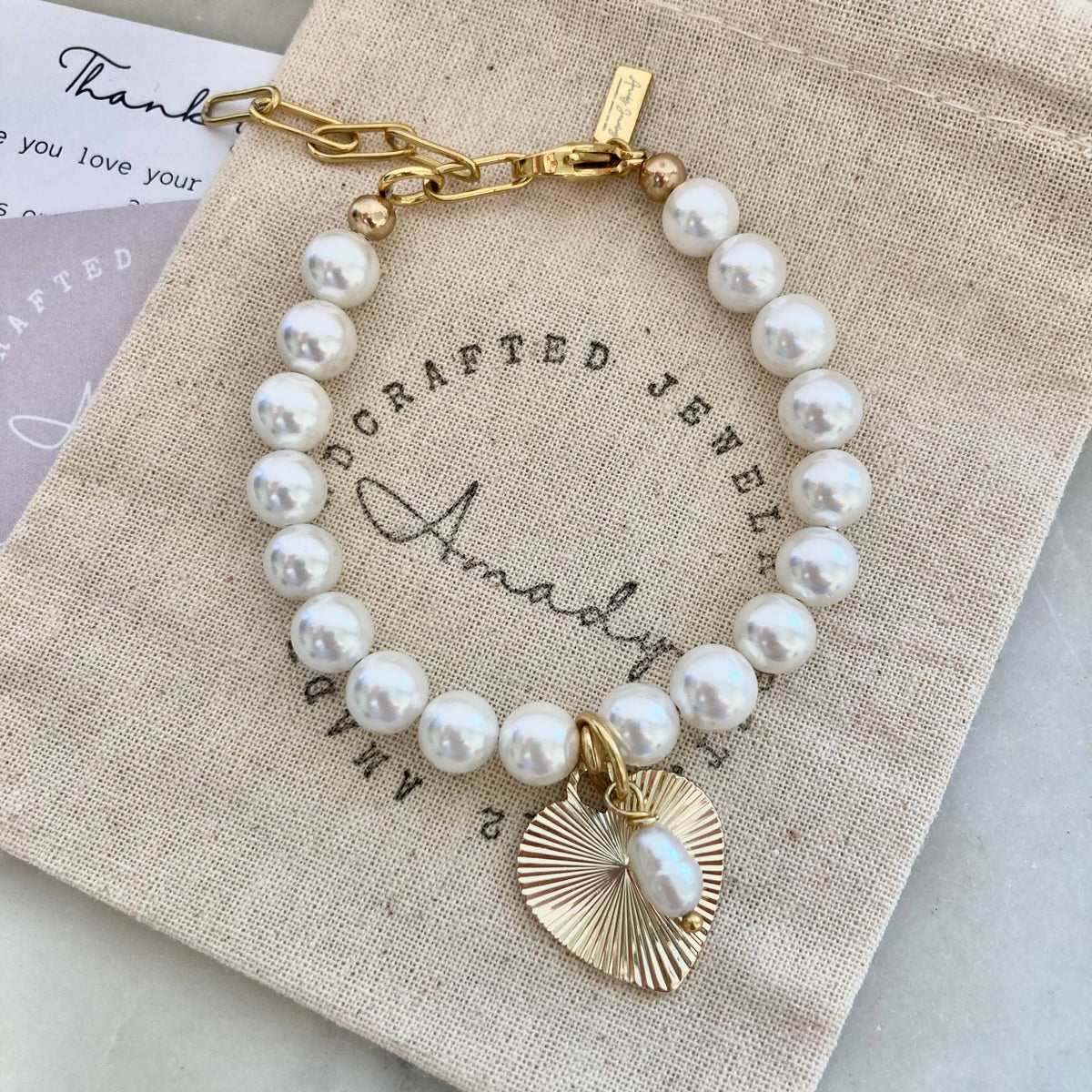Freshwater pearl gold heart charmed bracelet  coquette