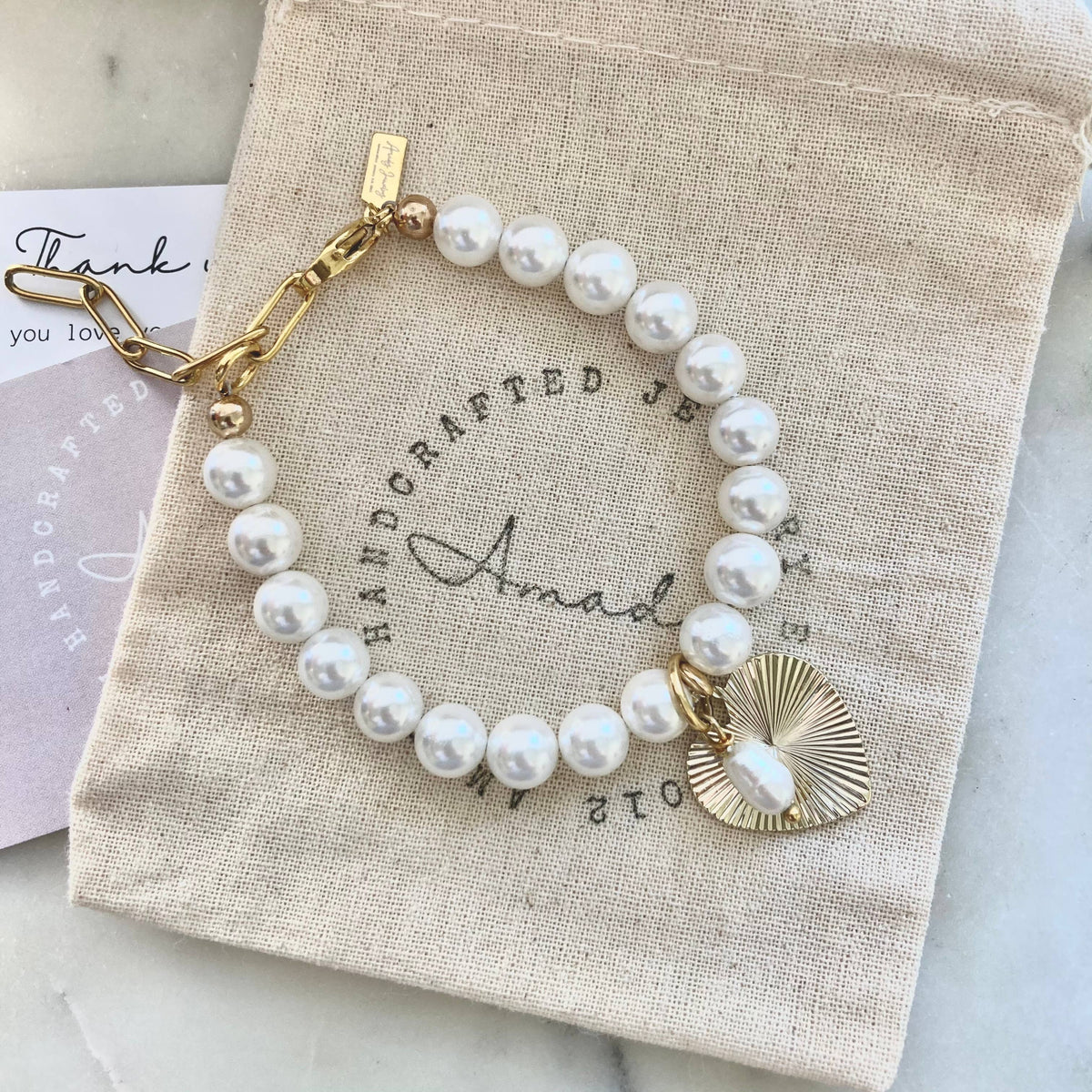 Freshwater pearl gold heart charmed bracelet  coquette