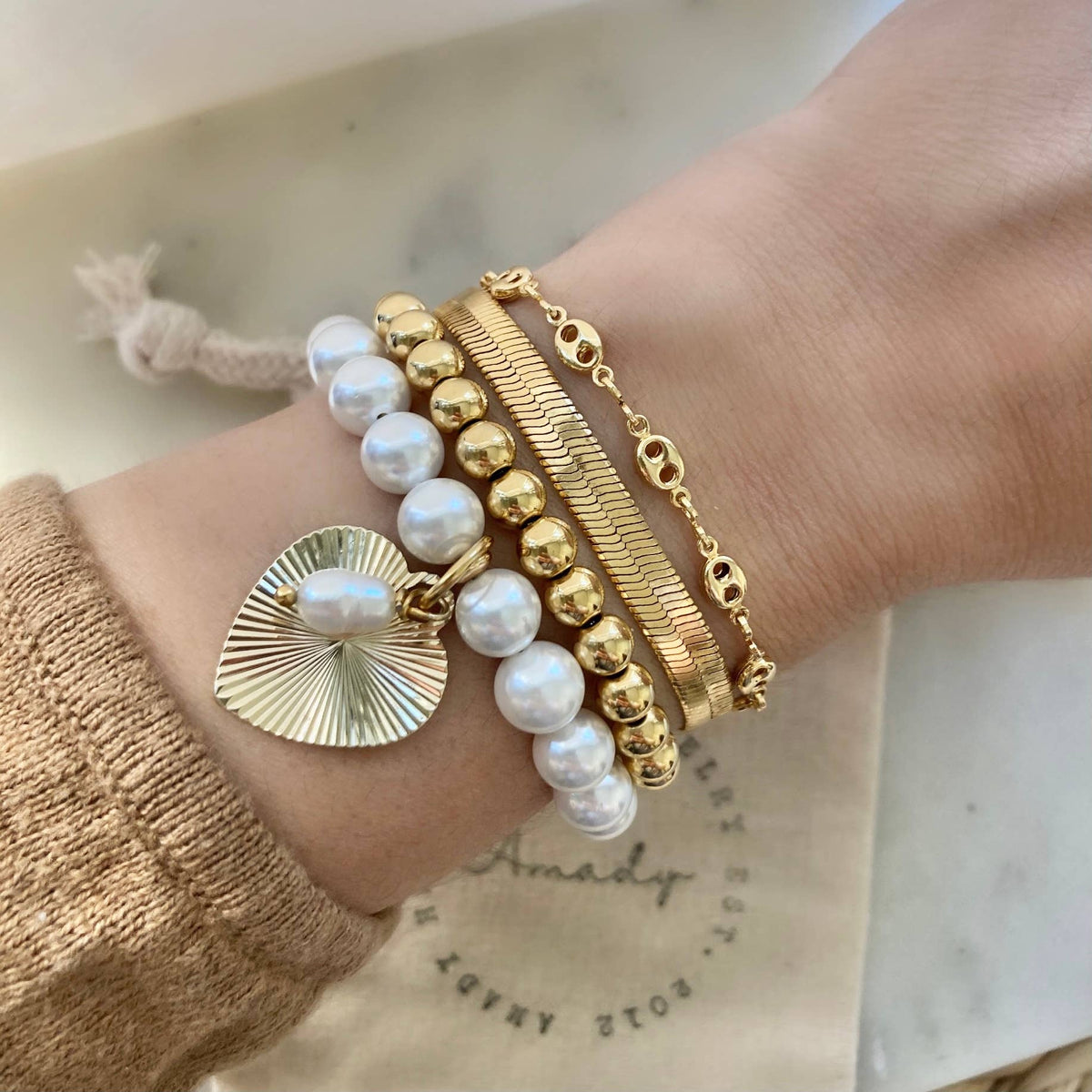 Freshwater pearl gold heart charmed bracelet  coquette