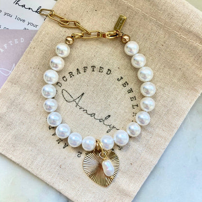 Freshwater pearl gold heart charmed bracelet  coquette